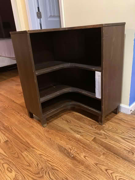 Photo of free Corner Wood Bookshelf (needs love) (Bed Stuy (Brooklyn)) #1
