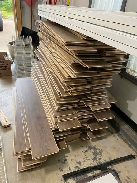 Photo of free Brown LVP flooring (Near Lake Resort Dr) #1