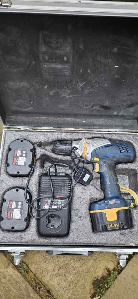 Photo of free Drill in case with 2 chargers (Leatherhead) #1