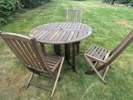 Photo of free Teak garden table & 3 chairs (Raynes Park SW20) #1