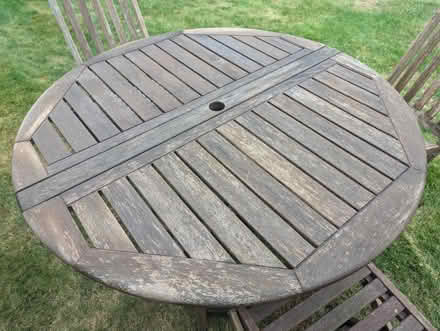 Photo of free Teak garden table & 3 chairs (Raynes Park SW20) #2