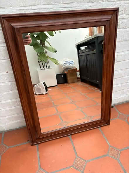 Photo of free Mirror with dark wood frame (E11) #1
