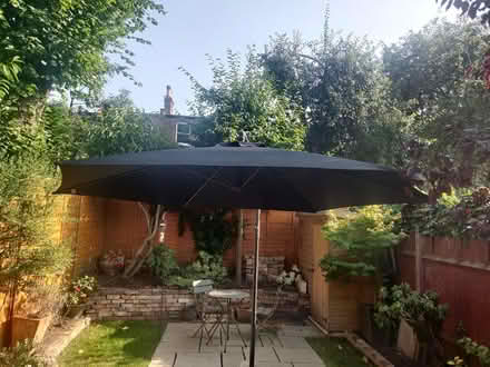 Photo of free Large garden parasol - used once (Hornsey N8) #1