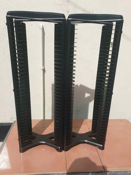 Photo of free 2 black plastic dvd storage towers (workington - CA14) #1