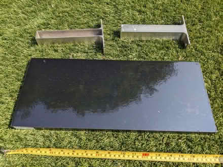 Photo of free IKEA black gloss shelf with brackets (New Cross SE14) #1