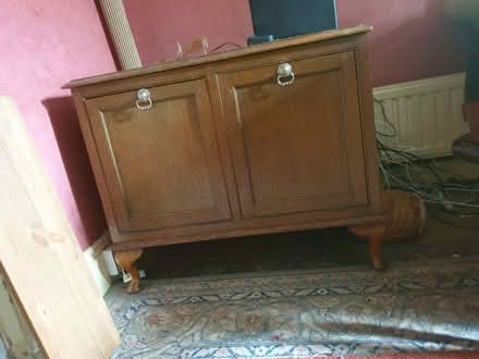 Photo of free Oak drop leaf storage cabinet (New Town CO1) #1