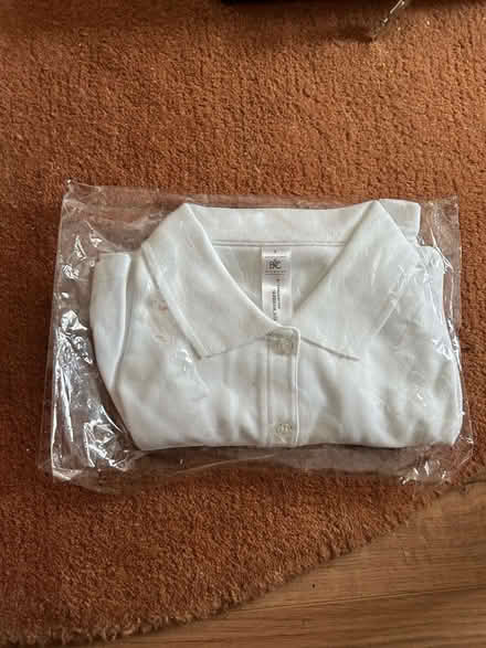 Photo of free Women’s white BMW polo (W7) #1