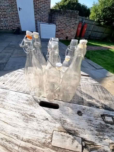Photo of free 6 large killer top bottles (Ninfield TN33) #1