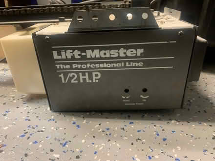 Photo of free Garage Door Opener + track + remote (Pound Ridge) #1