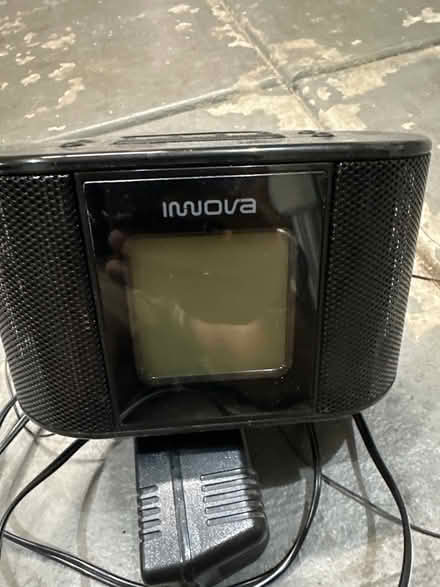 Photo of free Alarm clock w/ older iPod dock (Morgan hill) #1