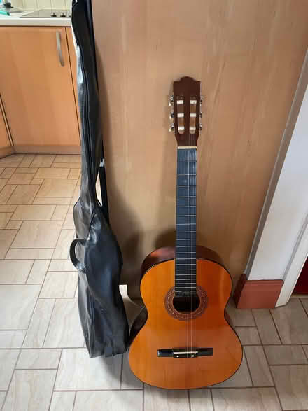 Photo of free Guitar + case (Sale M33) #1