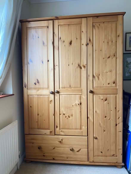 Photo of free large solid pine wardrobe (King's College Playing Fields HA4) #1