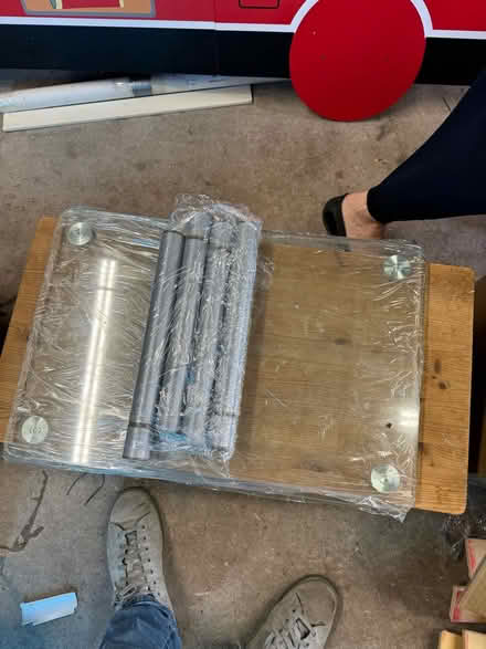 Photo of free Glass tv stand (TF10 8hr) #1