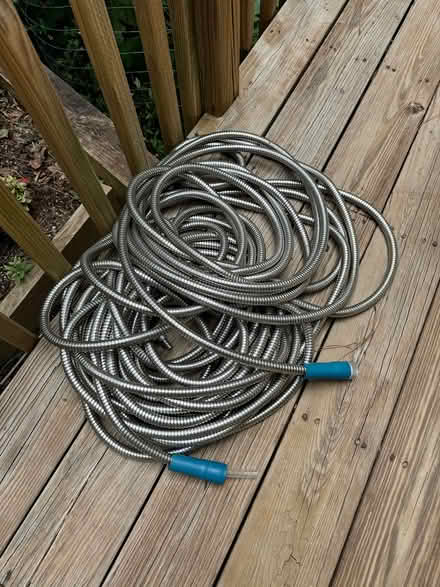 Photo of free 100 ft metal hose (Suwanee) #1