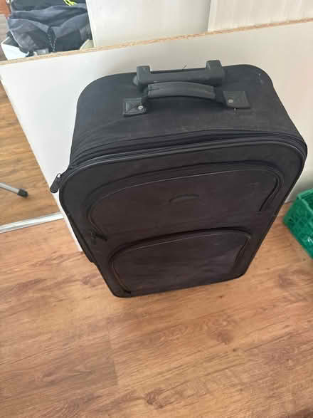 Photo of free Medium black suitcase (Telford, Madeley) #1