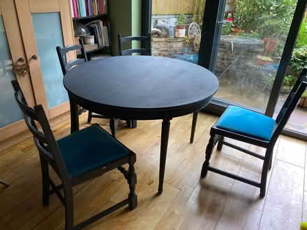 Photo of free Circular table painted black plus 2 inserts & 4 oak chairs (Enfield EN1) #1