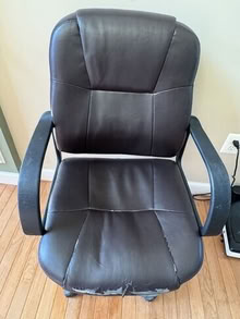 Photo of free Brown office chair, fraying in front #1