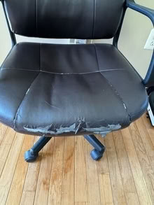 Photo of free Brown office chair, fraying in front #3