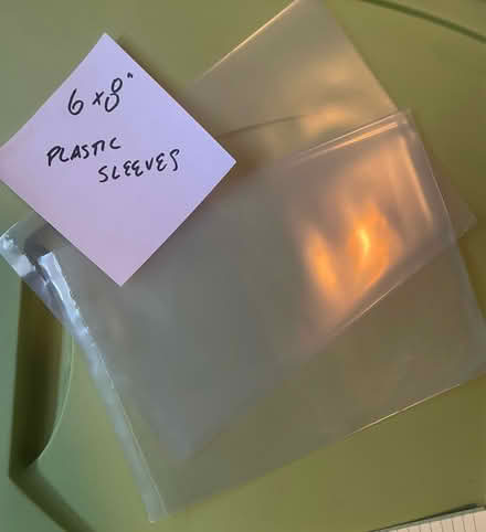 Photo of free 6x8 plastic sleeves (Lower east side) #1
