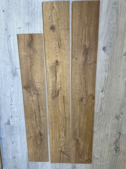Photo of free Wood effect/brown laminate leftovers - 0.75 msq (Chigwell IG7) #1