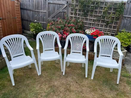 Photo of free 4 plastic white garden chairs (Joydens Wood DA2) #1