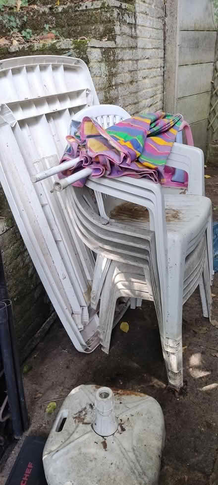 Photo of free Patio table, chairs and parasol (Woking GU22) #1