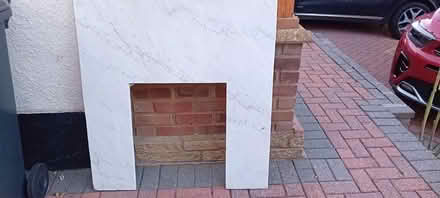 Photo of free Marble/stone fire surround/back (Baldock, SG7)