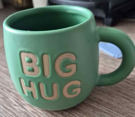 Photo of free Green 'big hug' mug (Cradley WR13) #1