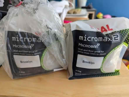 Photo of free 2 open bags of grout - dark grey (Eastcote Village HA5) #1