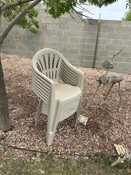 Photo of free 9 patio chairs. stackable . beige (Albuquerque) #1