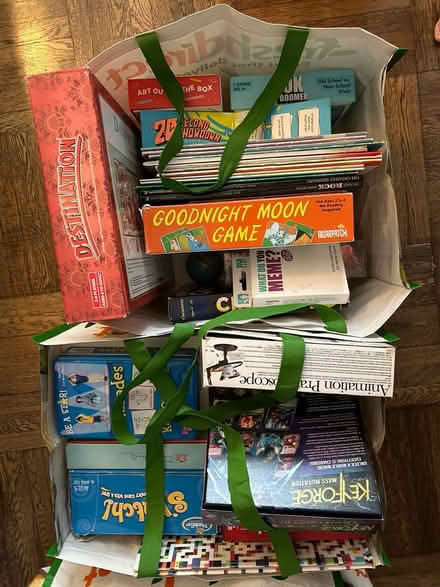 Photo of free Toys, games, piano books w/ 2 bins (UWS) #2