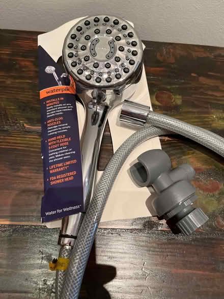 Photo of free Waterpik massage showerhead (Tribeca)