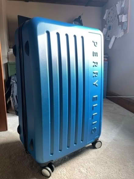 Photo of free Large blue hard suitcase (Barford NR9) #1