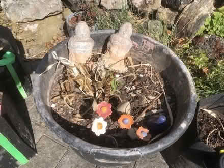 Photo of free 55cm wide, 35 high pot with Buddhas (Kirkstall LS5) #1