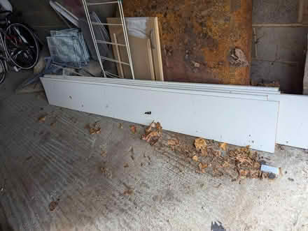 Photo of free 5 large garage shelves + brackets (Surrey Quays SE16) #1