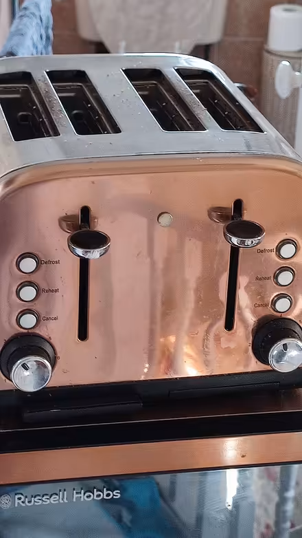 Photo of free 4 slice toaster, bronze colour, all working. (Northowram HX3) #1