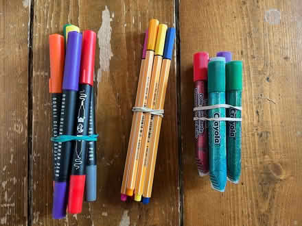 Photo of free Selection of pens and tubes of glitter glue (Lower Weston) #1