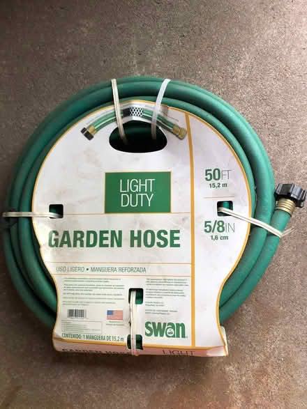 Photo of free 50 ft garden hose - never used (Woburn - four corners) #1