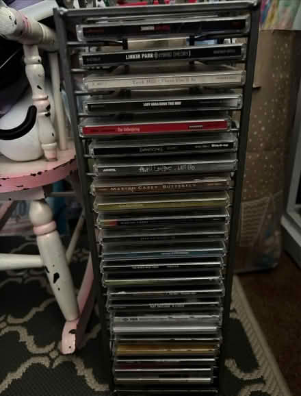 Photo of free 23 cds and cd rack (West Harrison) #1