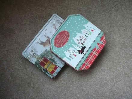 Photo of free 2 biscuit tins (dog) (Great Moor SK7) #1