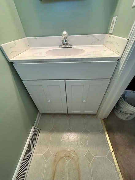 Photo of free Small vanity, top, and faucet (Clinton) #1