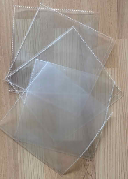 Photo of free Clear plastic CD/DVD sleeves (Chalford GL6) #1