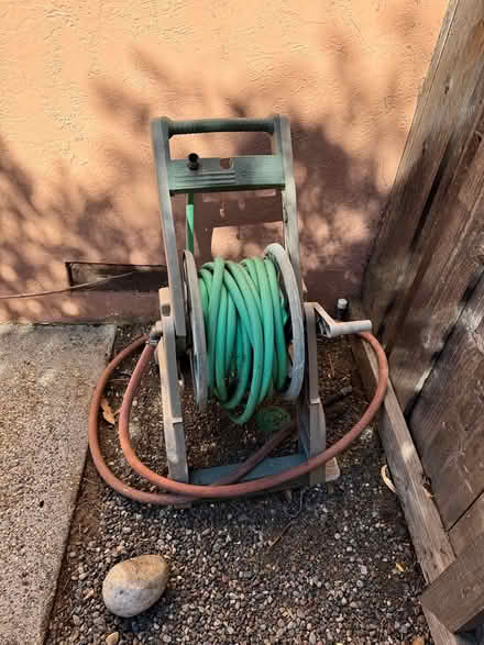 Photo of free Long garden hoses and rack (Terra Linda) #2