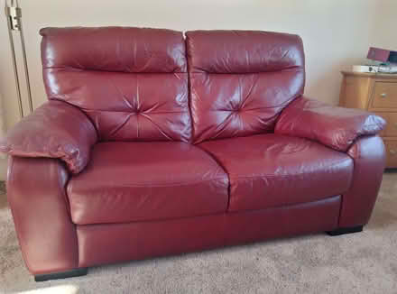 Photo of free 2 seater red leather settee (Southport PR9) #1