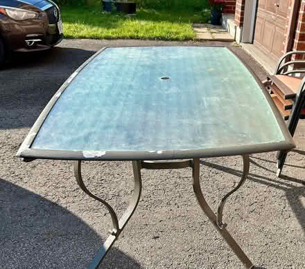 Photo of free Glass patio table and 6 chairs (Beaconhill South) #1