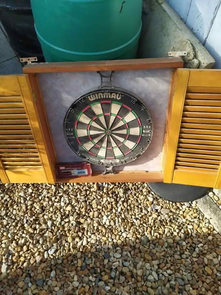 Photo of free Dart board in cabinet (Liss GU33) #1