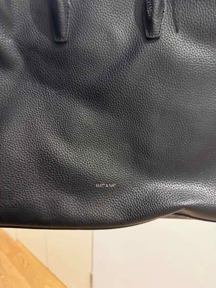Photo of free Black leather handbag (Bow E3) #4