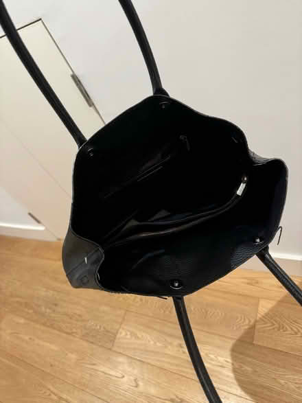 Photo of free Black leather handbag (Bow E3) #3