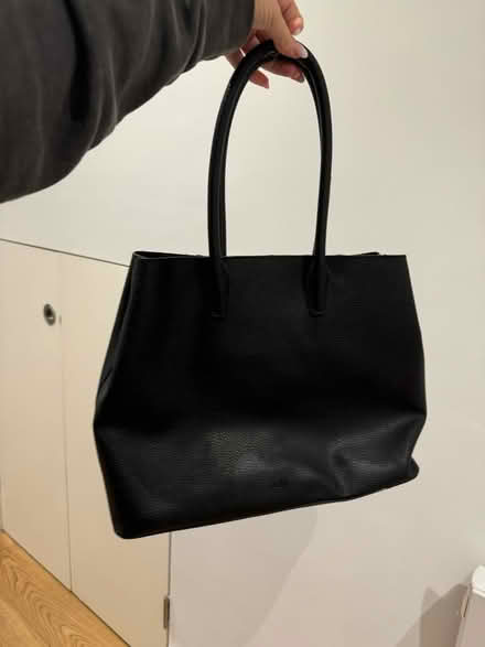 Photo of free Black leather handbag (Bow E3) #2