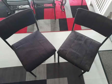 Photo of free 2 stacking black metal frame chairs (Hounslow TW5) #1